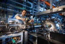 Laser strums atoms trillions of times in search for better computers